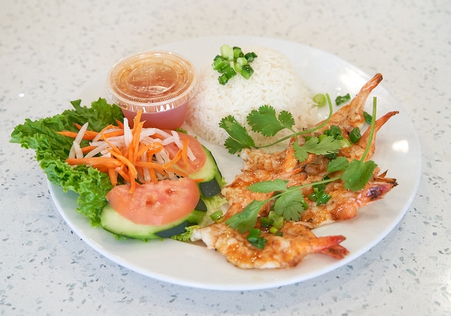 Delicious grilled shrimp served over fragrant jasmine rice